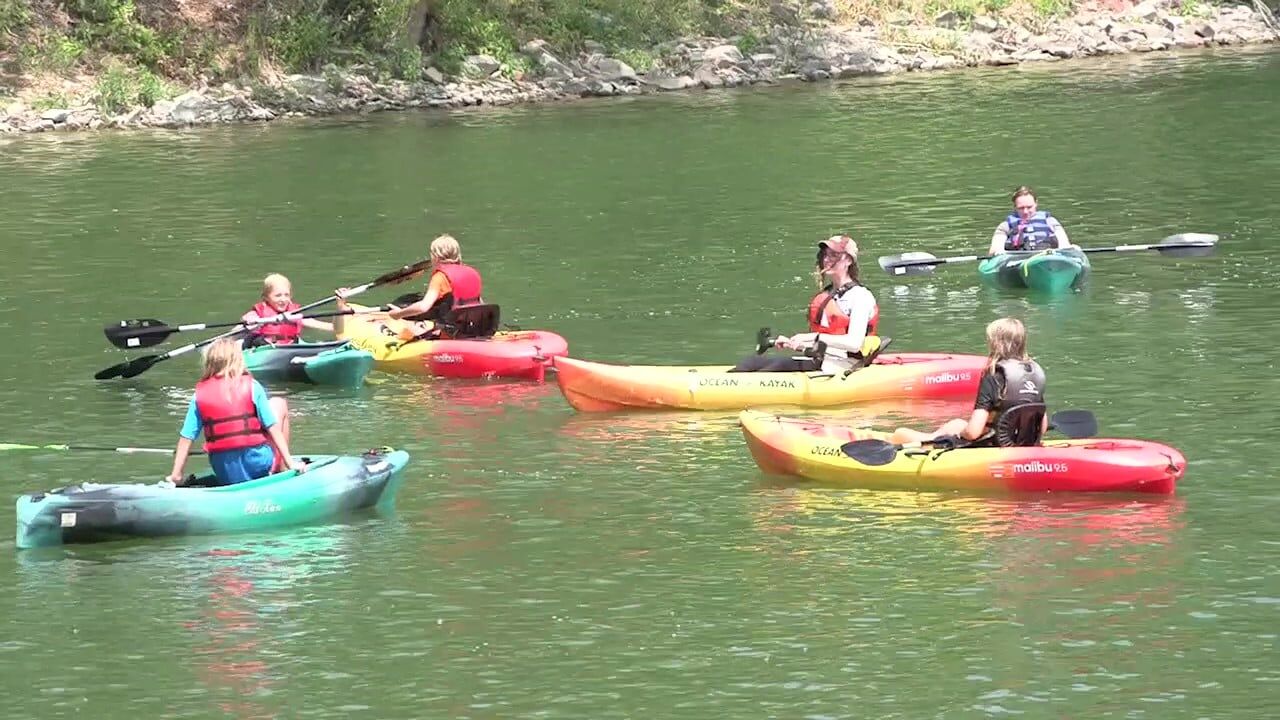 Campers go on a kayak adventure with the Johnny Appleseed Metropolitan Park District